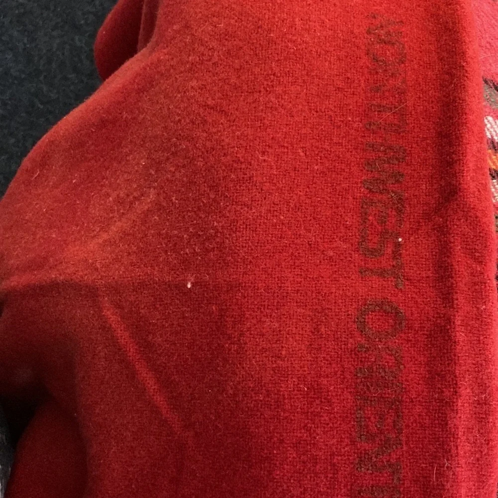 Vintage 1960’s lap blanket. “Northwest Orient” airlines. 42” x‎ 62”. 151 wool.